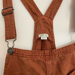 Adorable pair of burnt orange overalls perfect for fall!